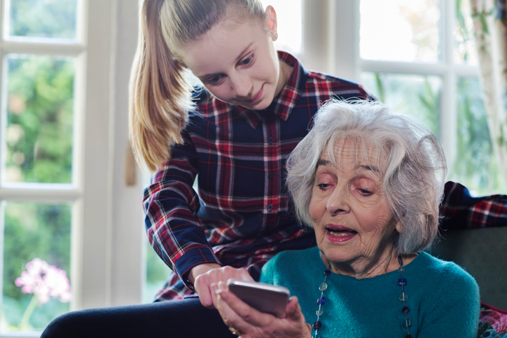 teen helping senior photo