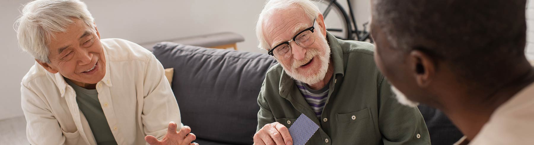 Senior men playing cards photo